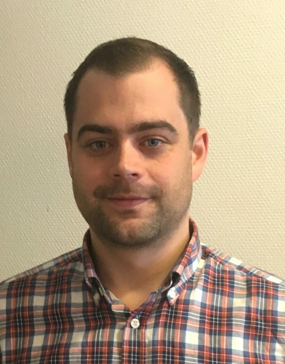 Kristoffer Holand er biologisk controller i Emilsen Fisk og har stor tro på at det nye fôringssystemet deres er fremtidens måte å drive oppdrett på. Foto: Arkiv.