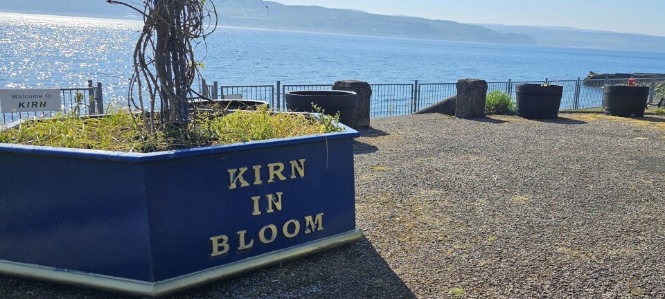 Volunteers give village garden a makeover with support from salmon farmer
